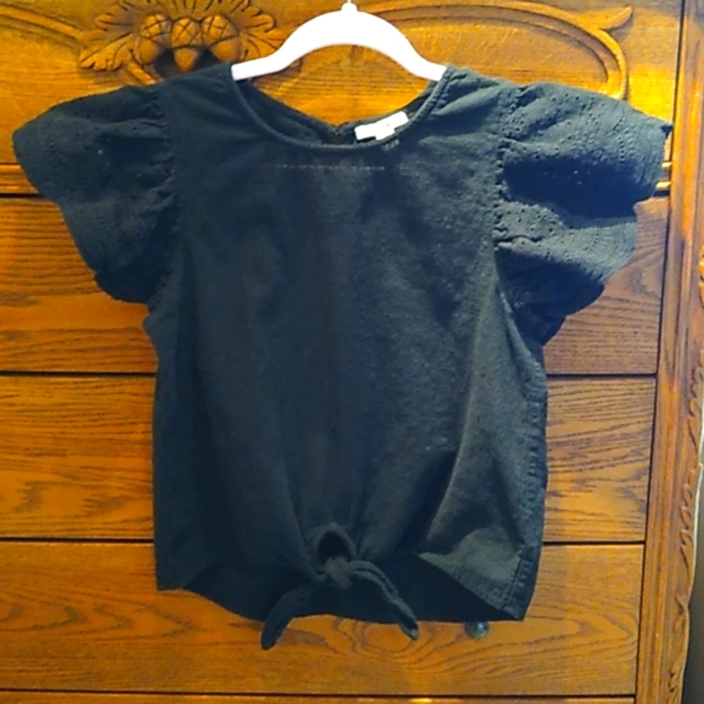 Adorable black top with cute angel sleeves great for summer in great condition.